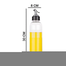 Plastic oil dispenser with a 1-liter capacity and a secure lid for easy use.